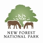 New Forest National Park logo with a green tree above two brown ponies and the text NEW FOREST NATIONAL PARK